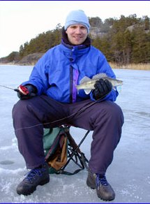 Osku and 38 cm legal size zander, It took blue Rapala balance jig.